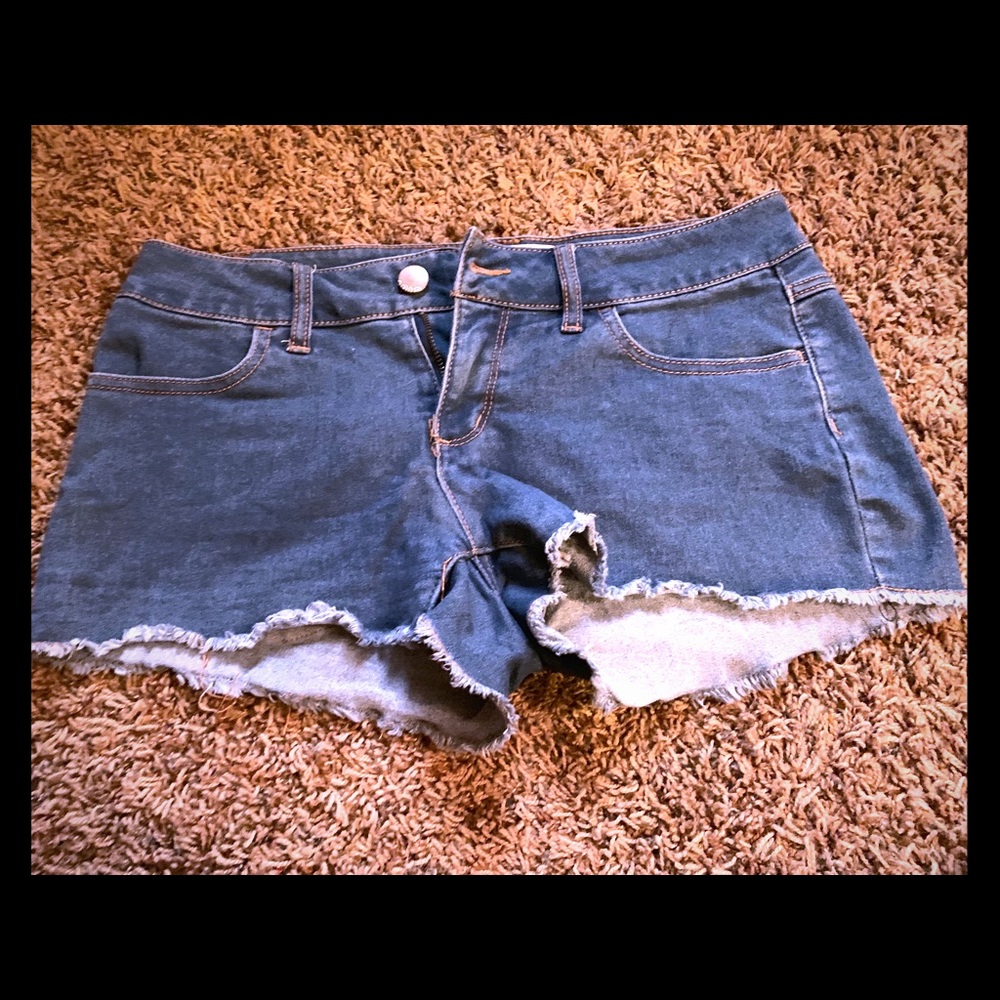 Frayed blue jean shirts